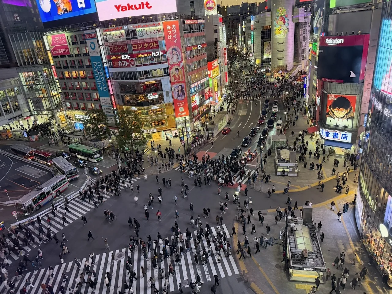 Shibuya Crossing from above after dark, March 2026